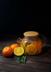 glass of orange tea and lemon