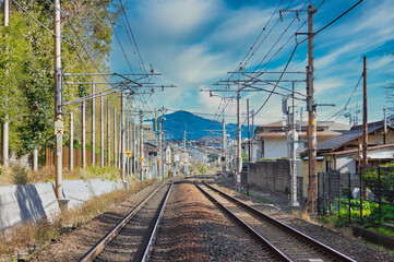 Fototapeta na wymiar Japan Kyoto Bamboo Forest local Railway track train