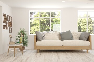 White living room with sofa and summer landscape in window. Scandinavian interior design. 3D illustration