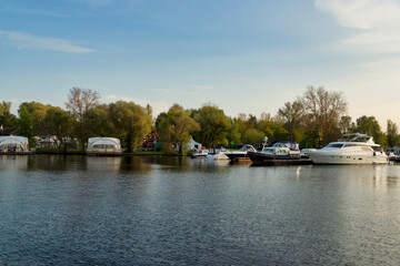 Yachts and boats on the Moscow river. Park zone in Strogino, Moscow - September 24, 2020