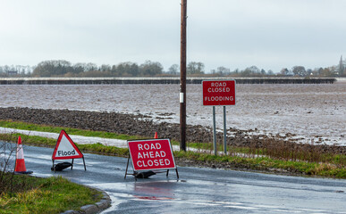Road ahead closed and flood warning signs on the road to Cawood Bridge in Selby, North Yorkshire...