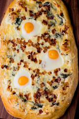 Flatbread pizza with meatballs, marinara sauce, Parmesan cheese and fresh Italian parsley. Classic American or Italian restaurant favorite. Homemade pizza dough with sauces, meats and cheeses.