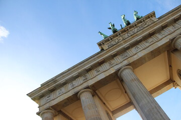 triumphal arch in berlin sunny day against blue sky