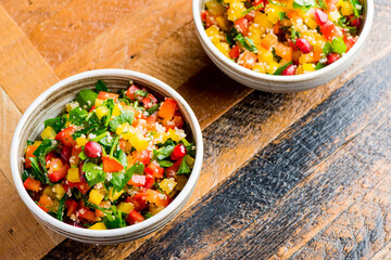 Mediterranean Mezze Salad. A Mediterranean classic Israeli salad made with sweet bell peppers, fresh mint, feta cheese and dressed with olive oil, lemon, and salt and pepper.