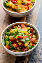 Mediterranean Mezze Salad. A Mediterranean classic Israeli salad made with sweet bell peppers, fresh mint, feta cheese and dressed with olive oil, lemon, and salt and pepper.