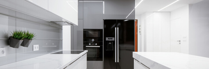 Luxury gray and white kitchen, panorama