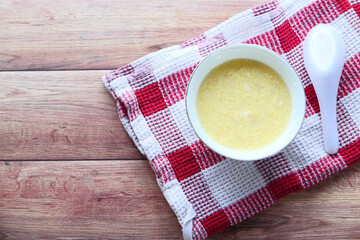 Thai hot spicy soup in bowl on table 