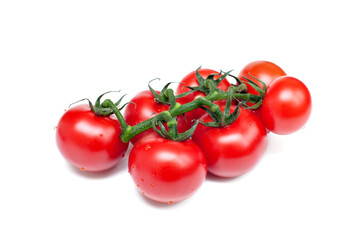 Bunch of fresh red tomatoes with green stems on a white background.