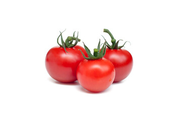 Three red tomatoes on a white background