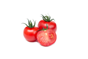 Fresh red tomatoes and tomato cut in half on white background