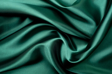 green fabric texture background, abstract, closeup texture of cloth
