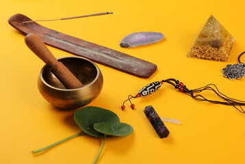 Tibetan dzi bead amulet necklace, tibetan singing bowl and other Success and prosperity symbols on...