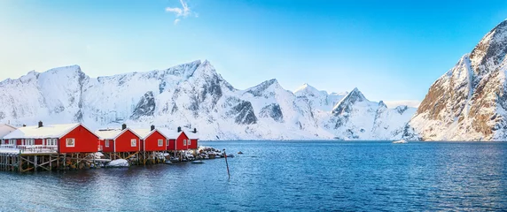 Aluminium Prints Reinefjorden Traditional Norwegian red wooden houses (rorbuer) on the shore of  Reinefjorden near Hamnoy village