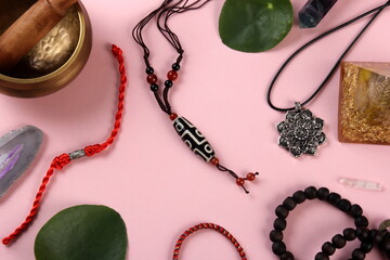 Tibetan dzi bead amulet necklace, tibetan singing bowl and other Success and prosperity symbols on...