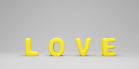 Yellow Love Text Sign on gray studio background