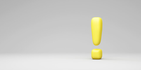Yellow Exclamation Mark on gray studio background