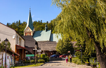 Panoramic view of central market square of historic royal open-air museum town of Lanckorona in...
