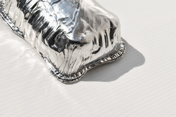aluminum foil tray on white background with copy space