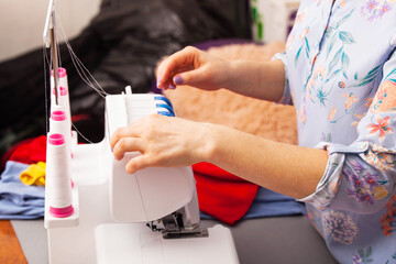 designer with arms folded in a bright creative office