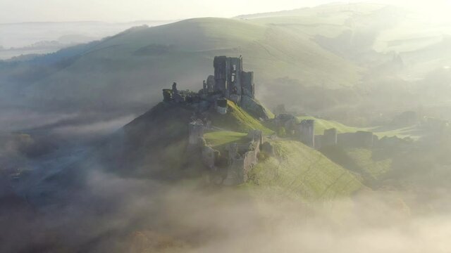 Aerial footage of Corfe Castle, Corfe, Isle of Purbeck, Dorset, England