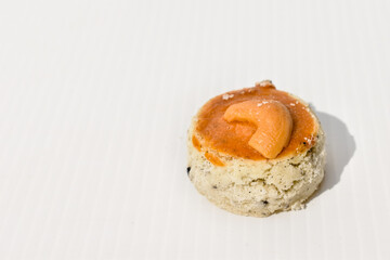 mini biscuits on white background with copy space