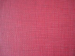fabric texture background. simple linen textured backdrop in bright red colors.