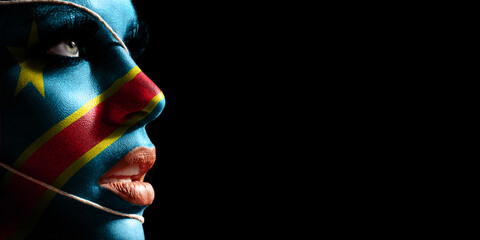 Democratic Republic of Congo flag painted on a face of a young woman, national flag