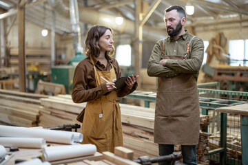Two carpentry workers at the manufacturing