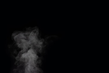 Figured smoke on a dark background. Abstract background, design element, for overlay on pictures.