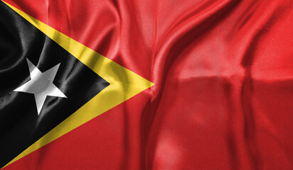East Timor flag wave close up. Full page East Timor flying flag. Highly detailed realistic 3D rendering