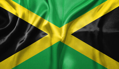 Jamaica flag wave close up. Full page Jamaica flying flag. Highly detailed realistic 3D rendering