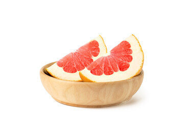 Fresh pink grapefruit fruit. Grapefruit slice on wood bowl isolated on white background with clipping path