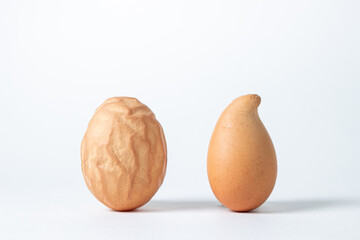 Deformed chicken eggs. Chicken eggs on a white background. © Ruzanna