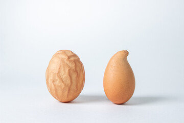 Deformed chicken eggs. Chicken eggs on a white background.