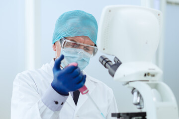 close up. a scientist biologist works in a laboratory. science