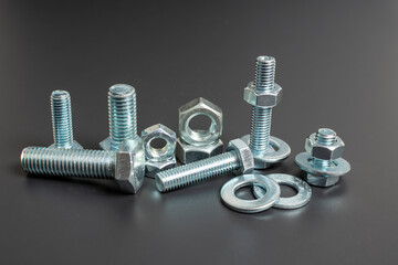 close-up of metal fasteners on black background