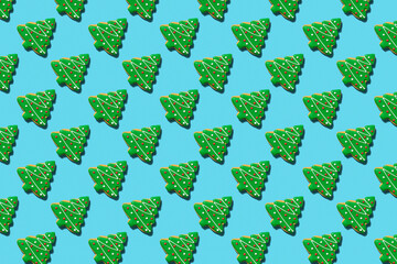 Christmas or New Year seamless pattern of Christmas tree on blue background. Greeting card. Good for wallpaper, textile, background, poster, cover of book, post cards