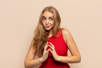 blonde woman scheming and conspiring, thinking devious tricks and cheats, cunning and betraying