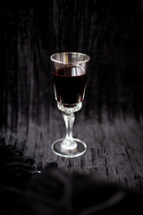 nice glass of red wine on a black background Velvet