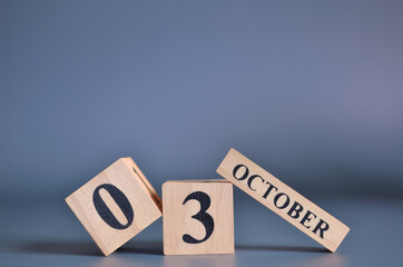 October 3, Cover in the evening time, Date Design with number cube for a background.