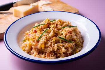 Traditional paella with vegetables and iberico ham