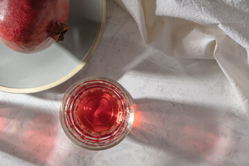Pomegranate and fruit  tea, hard light with harsh shadows