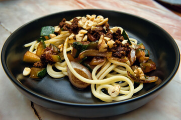 Asian food on black plate