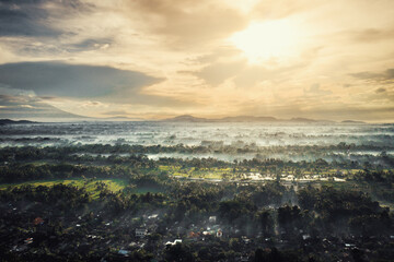 Golden sunrise above Bali with a drone