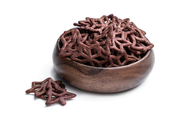 Christmas tree shapes pretzel in wooden bowl isolated on white background