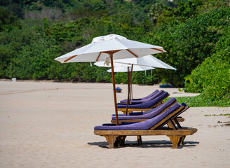 Chairs And Umbrella In Lanta Beach - Tropical Holiday.