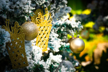 decorated Christmas tree on blurred background.