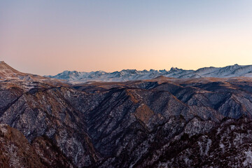 Fototapeta na wymiar Mountain ranges at sunset in winter.