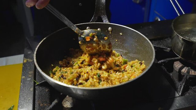 A chef's cooking rice.Turkish cuisine