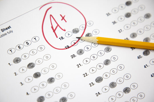 good grade in school on an exam or test, passing a standardize test. 